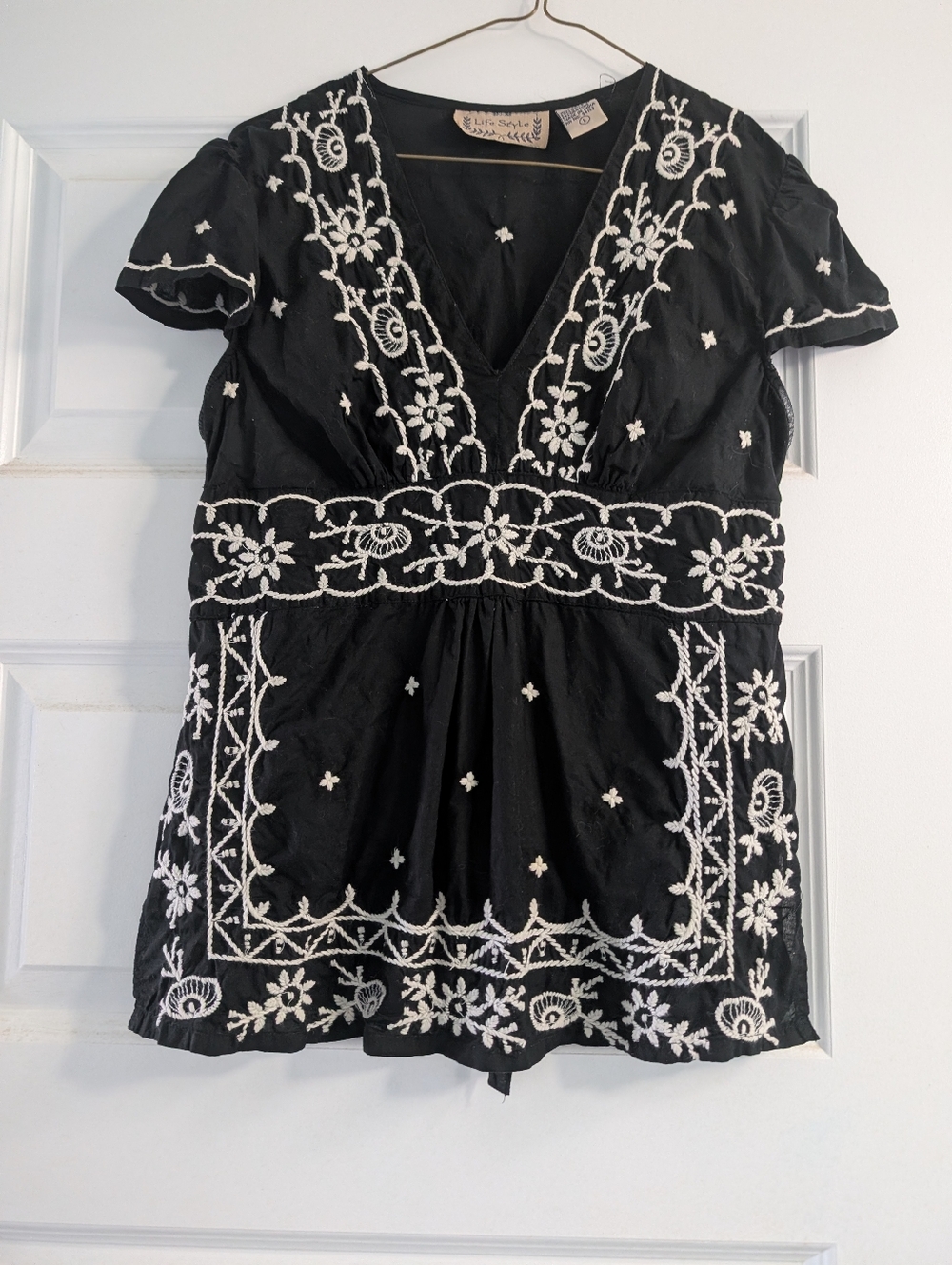 Embroidered V-Neck Black Women’s Top with White Floral Stitching